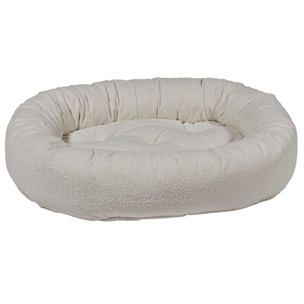 Bowsers Donut Dog Bed with oval bolster design in Vanilla performance terry fabric