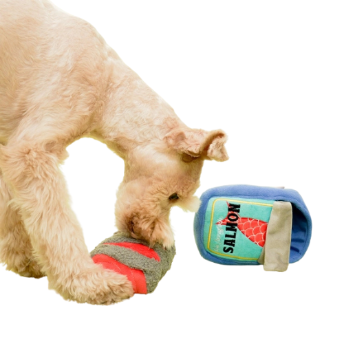 Dog using tinned salmon nosework snuffle dog toy to search for hidden treats