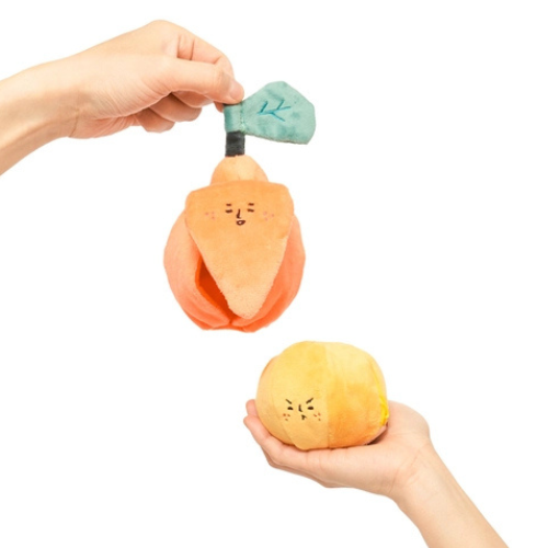 Two-piece orange dog toy designed for nosework and scent training
