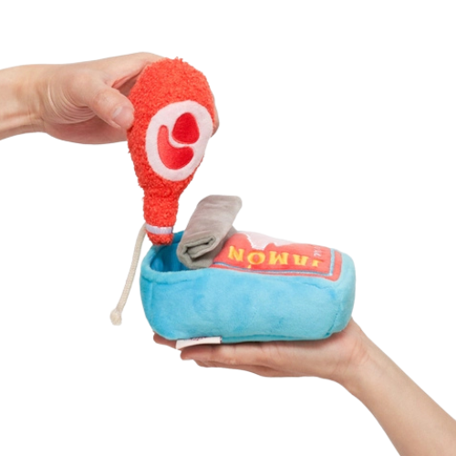 Interactive tinned jamón dog toy showing two-piece puzzle feature