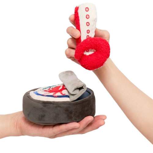Two-in-one interactive treat-hiding dog toy shaped like a tin of octopus 